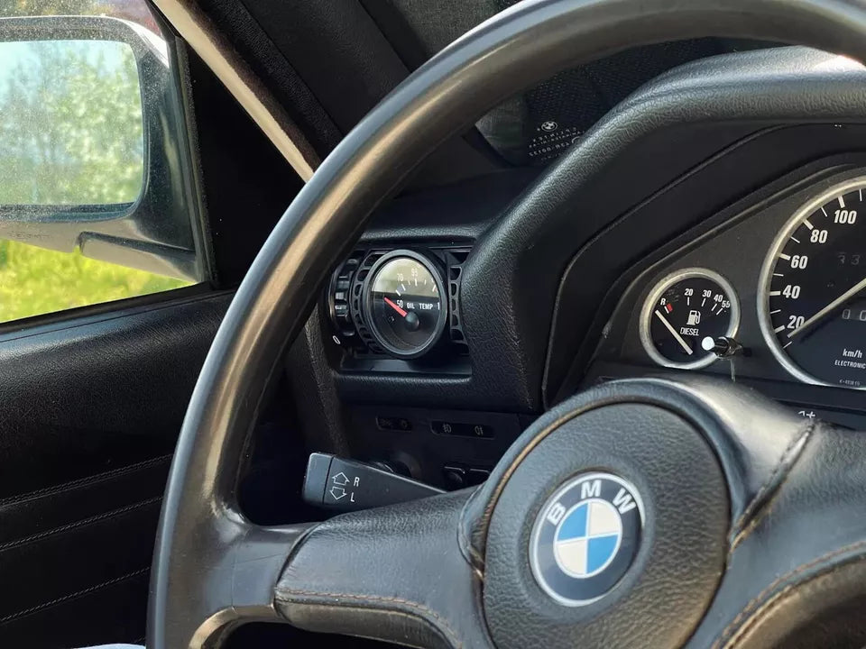 BMW E30 interior with driver side gauge pod installed