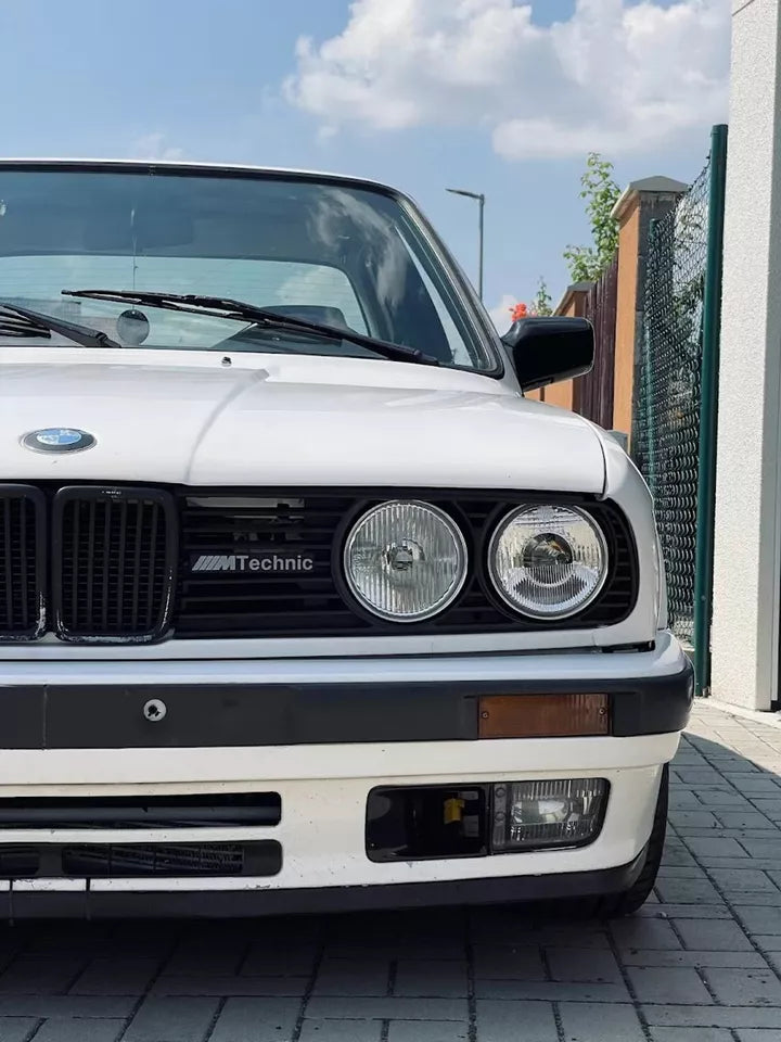 Wide shot of bmw ///m technic badge with car