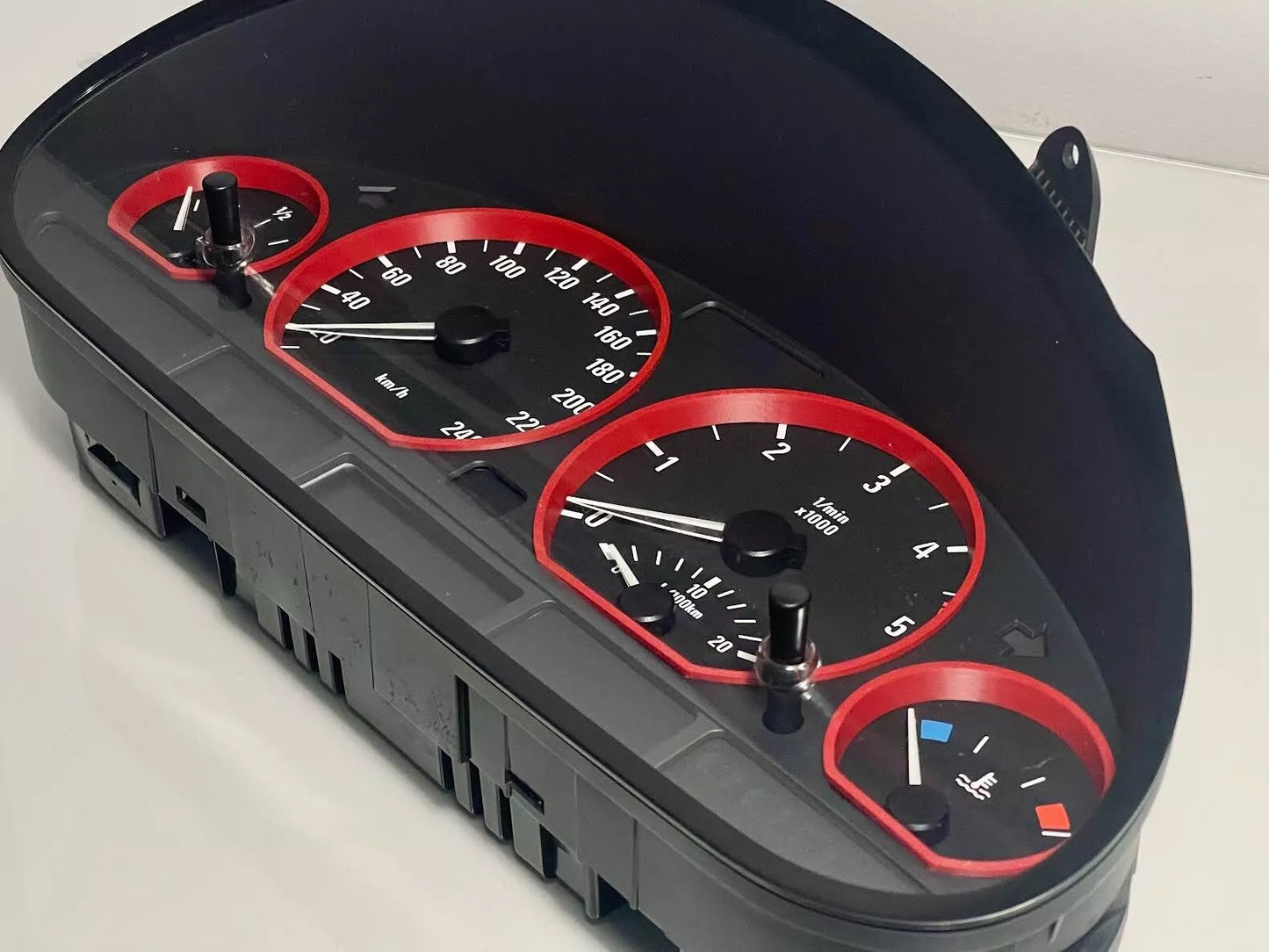 BMW E30 Gauge Cluster Rings in red installed on dashboard