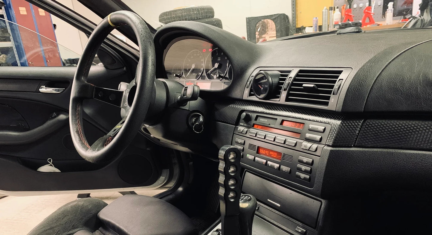 Close-up of BMW E46 Center Gauge Pod installed in center air vent