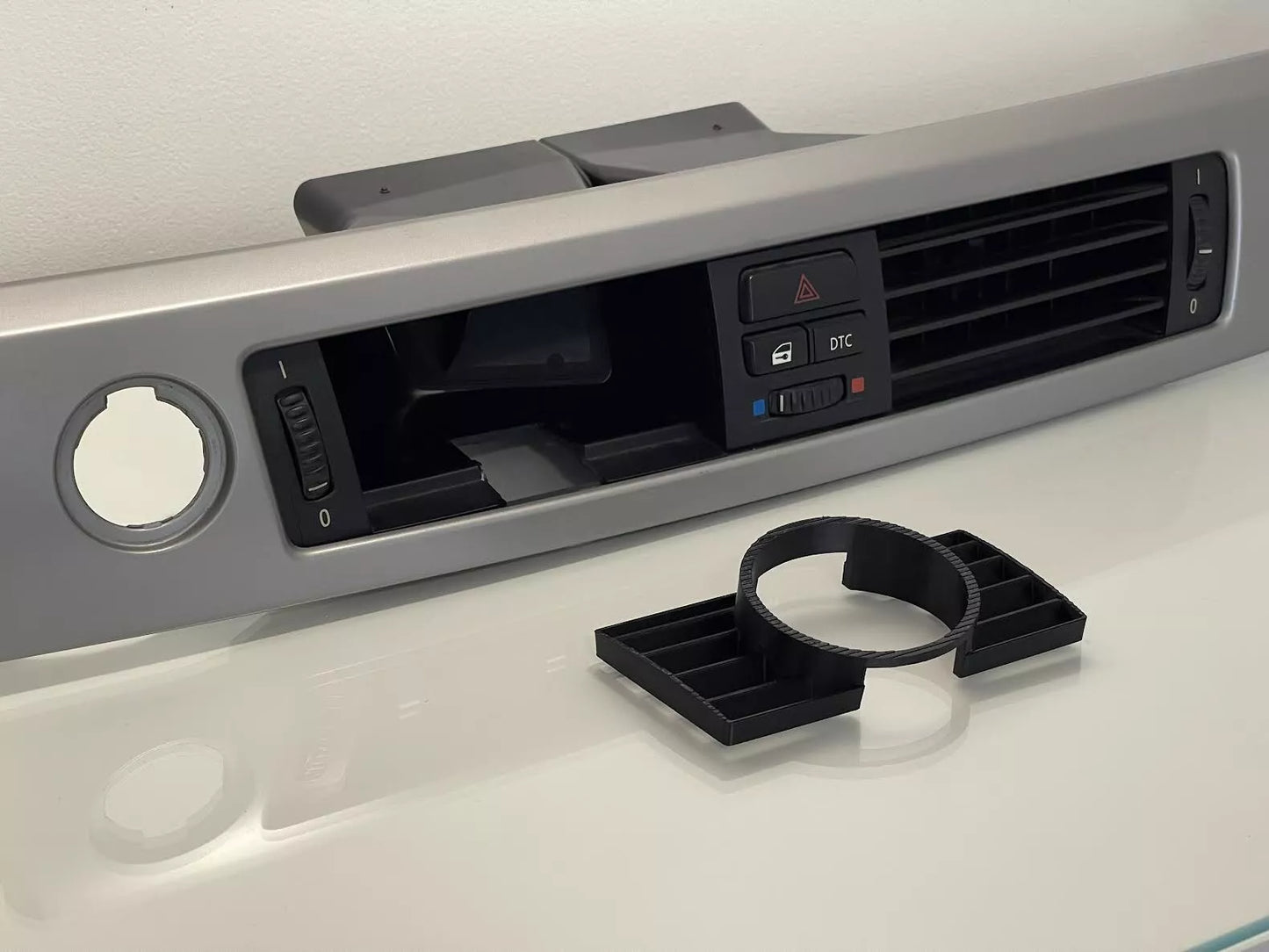 Close-up of BMW E90 Center Gauge Pod installed in center air vent