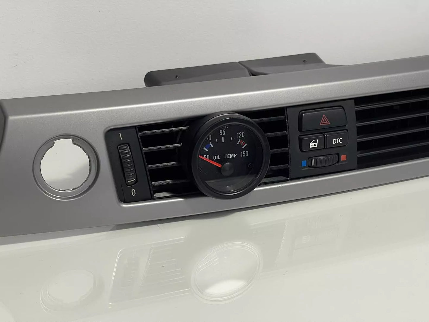 BMW E90 Center Gauge Pod installed in center air vent - wide shot showing dashboard integration