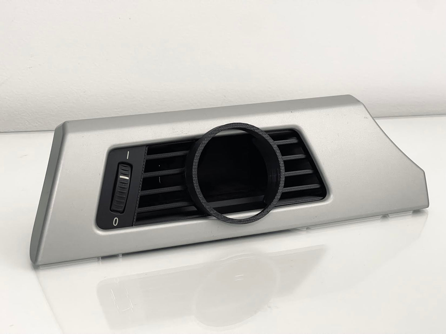Close-up of BMW E90 Driver Side Gauge Pod installed in driver side air vent