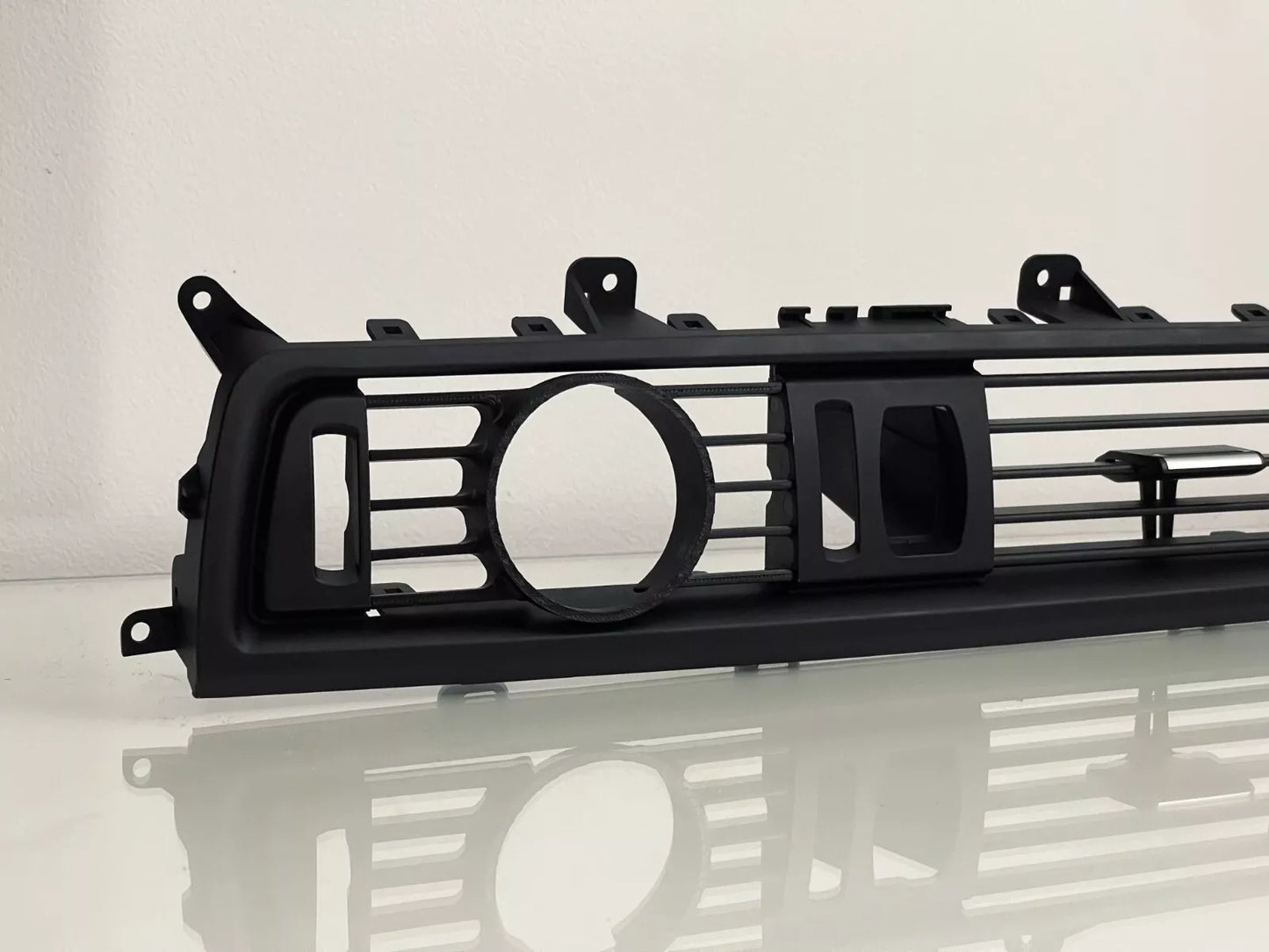 Close-up of BMW F10 Center Gauge Pod installed in center air vent