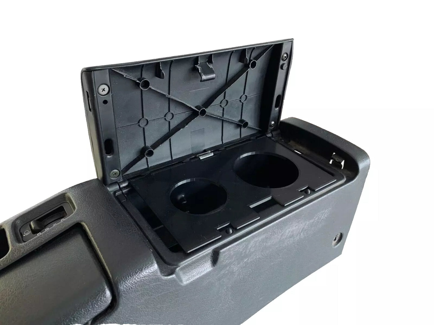 Honda Del Sol Cup Holder empty, showing storage space