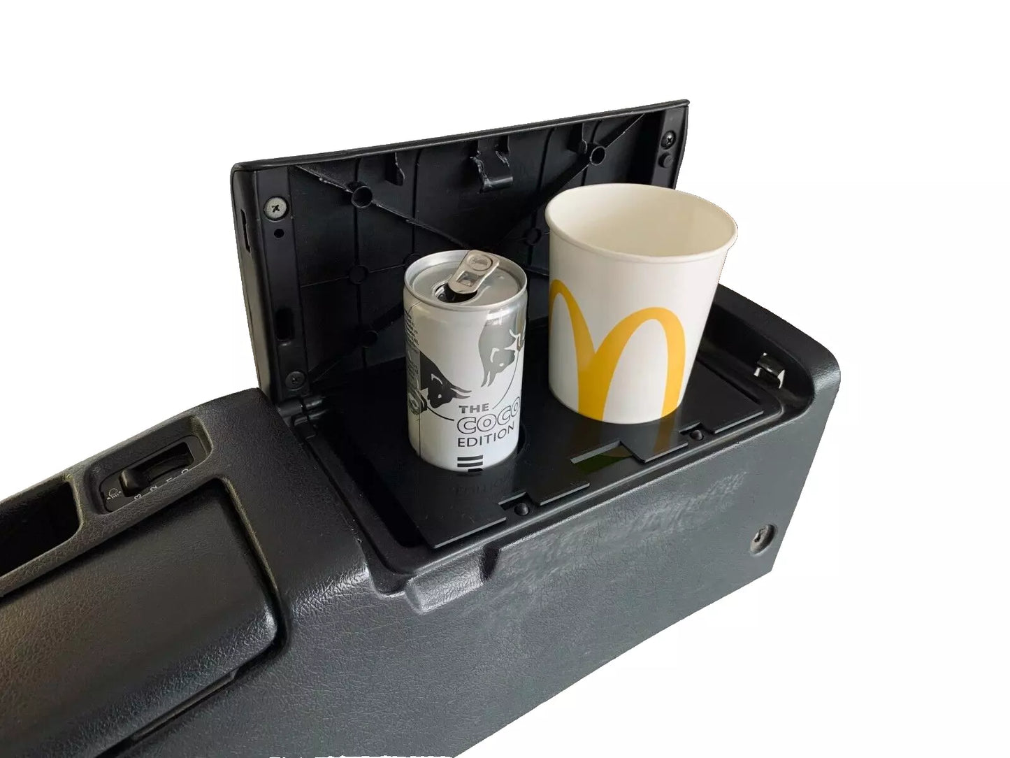 Honda Del Sol Cup Holder with beverage inside, securely holding a drink