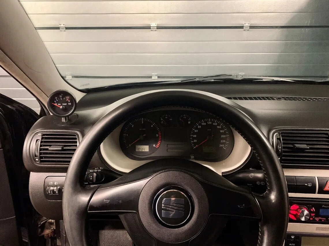 Car interior with steering wheel, gauges & boost gauge | Automotive Culture