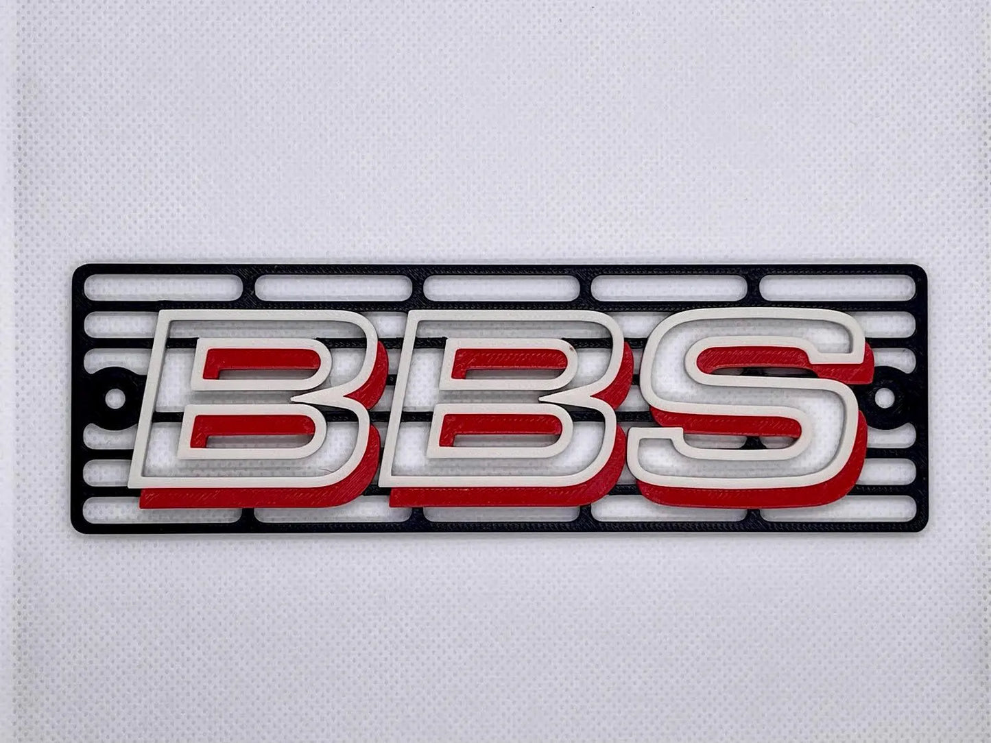 Custom 3D printed BBS-style turn signal cover installed on a BMW E30 front indicator housing.