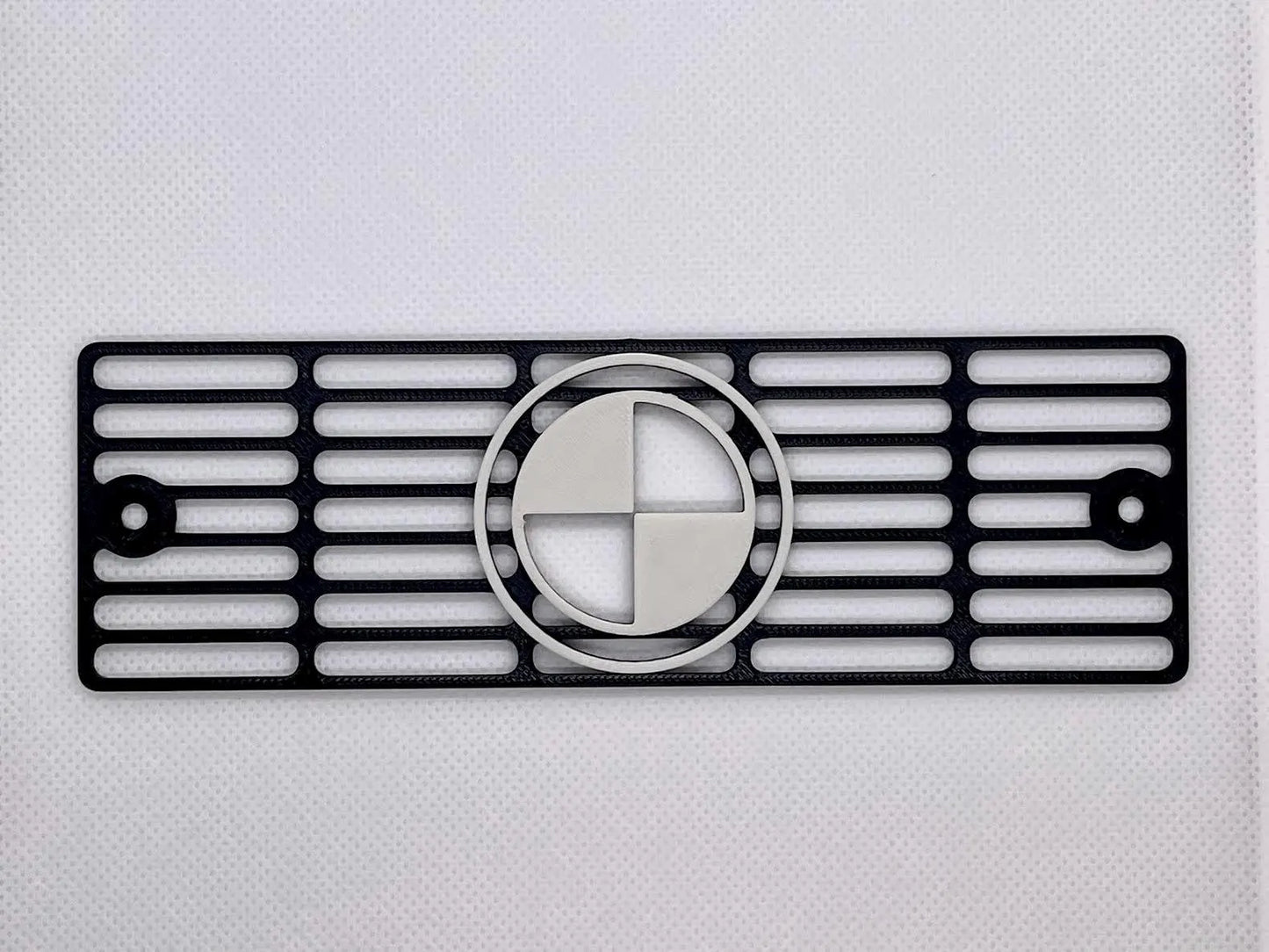Custom 3D printed BMW Classic logo turn signal cover for the BMW E30 front indicator housing.