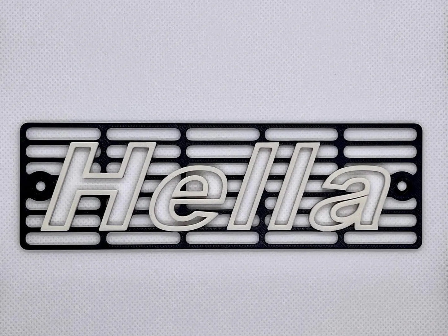 Custom 3D printed Hella-style turn signal cover for the BMW E30 front indicator housing.