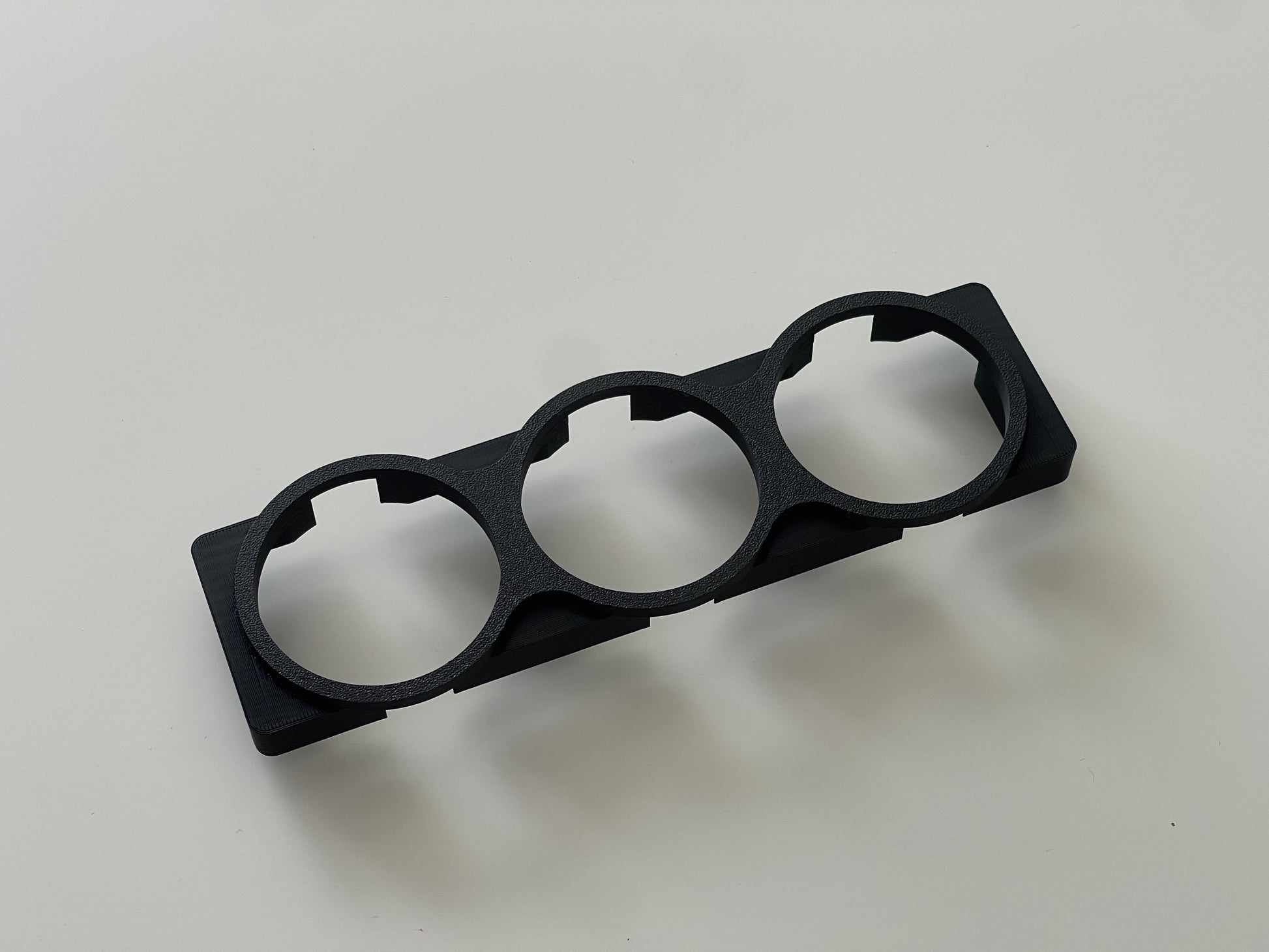 Honda Civic EK tripple gauge pod standalone, shown from a high-angle perspective on a light gray background.