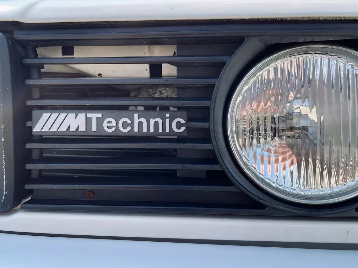 Close up shot of ///M Technic badge